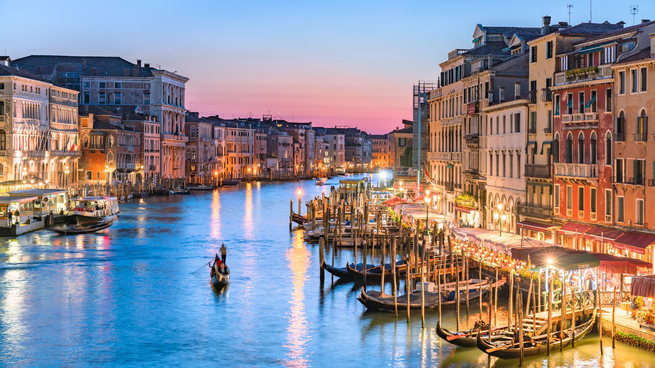 gondolier-heads-into-the-sunset-along-venice-s-grand-canal--sunset--1062428612-261501b5a5f44ffc95f012f908750ad4.jpg